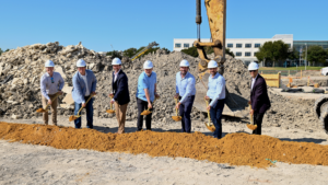 Photo of people with shovels breaking ground 